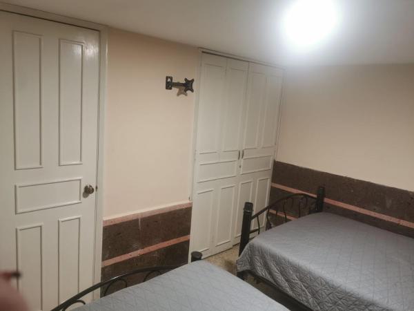 Margaritas Eco Haus : photo 7 de la chambre chambre quadruple avec salle de bains