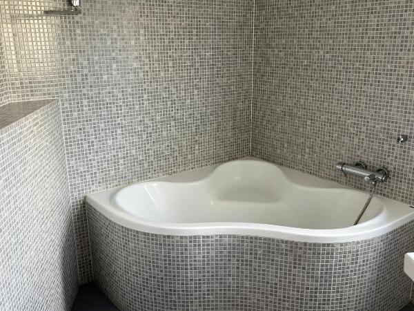 Waw pokoje Wilanów : photo 4 de la chambre chambre double deluxe avec baignoire