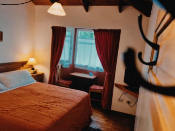 Hosteria Cauquenes De Nimez : photo 7 de la chambre chambre lits jumeaux/double standard
