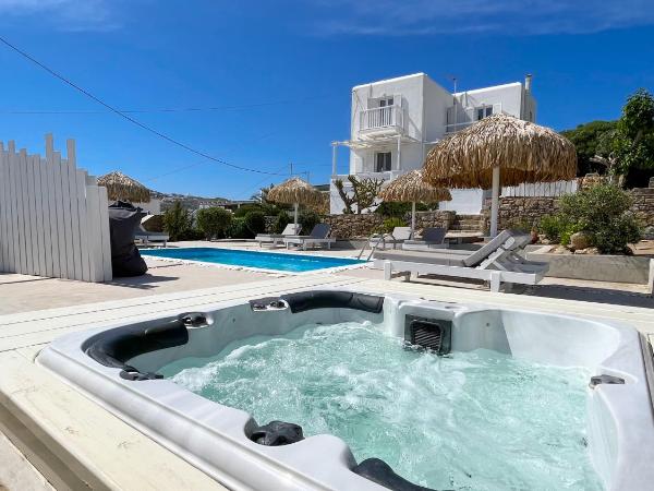 Amperian Mykonos Suites & Villas : photo 2 de la chambre villa 4 chambres avec piscine privée et bain à remous - vue sur mer