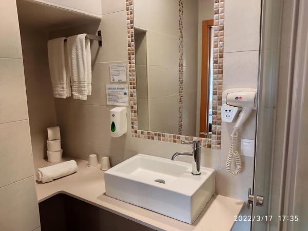 Consolação Pedramar : photo 1 de la chambre chambre double ou lits jumeaux avec salle de bains privative
