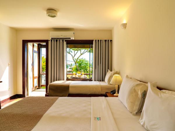Buzios Mar Hotel : photo 3 de la chambre chambre double deluxe - vue sur jardin