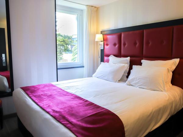 Logis Hôtel Saint Guirec Et De La Plage : photo 1 de la chambre chambre double - vue sur jardin