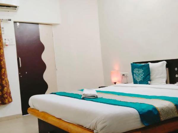 Homestayinn : photo 3 de la chambre chambre deluxe double ou lits jumeaux