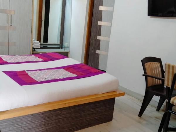 Homestayinn : photo 2 de la chambre chambre deluxe double ou lits jumeaux