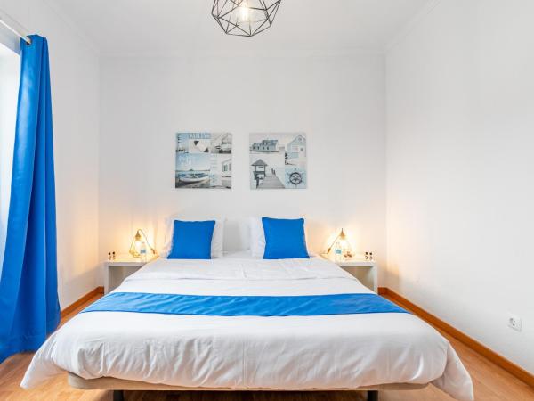 Encarnação Home : photo 3 de la chambre chambre double standard avec salle de bains commune