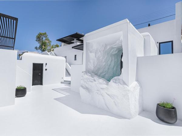 Tagoo Black Mykonos : photo 3 de la chambre hébergement double Économique avec piscine troglodyte privée