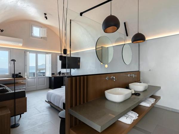 Hom Santorini : photo 8 de la chambre suite deluxe avec jacuzzi extérieur - vue sur mer