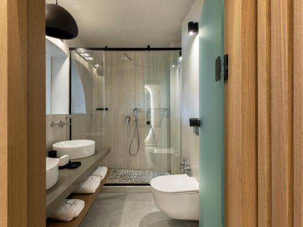Hom Santorini : photo 9 de la chambre suite deluxe avec jacuzzi extérieur - vue sur mer