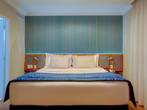 Quality Suítes Oscar Freire : photo 4 de la chambre business class suite king bed