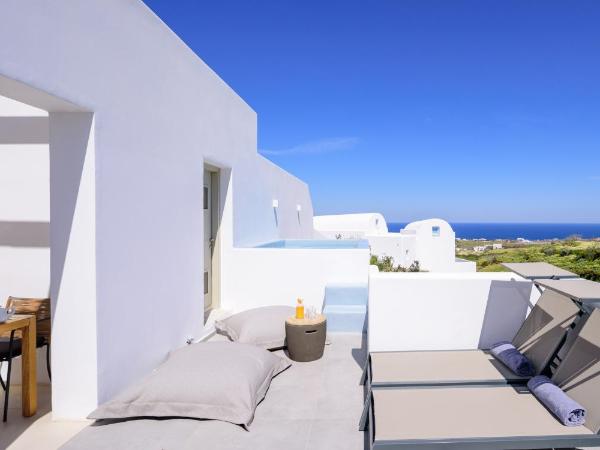 Este Luxury Suites : photo 8 de la chambre suite junior avec bain à remous - vue sur mer