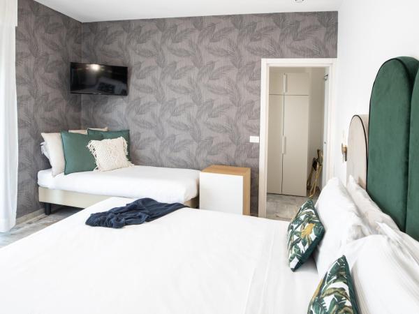 Hotel Brennero : photo 3 de la chambre chambre triple avec balcon