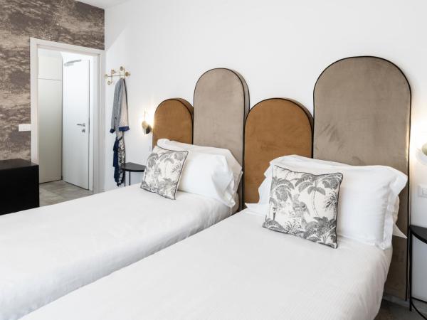 Hotel Brennero : photo 4 de la chambre chambre triple avec balcon