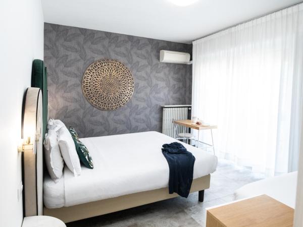 Hotel Brennero : photo 1 de la chambre chambre triple avec balcon