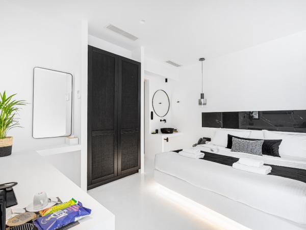 Tagoo Black Mykonos : photo 7 de la chambre suite premium avec 2 chambres et piscine privée