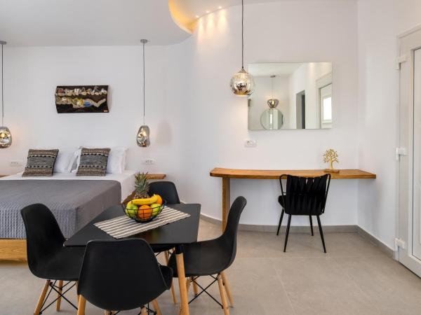 Alizea Villas & Suites : photo 5 de la chambre suite lit queen-size avec baignoire spa