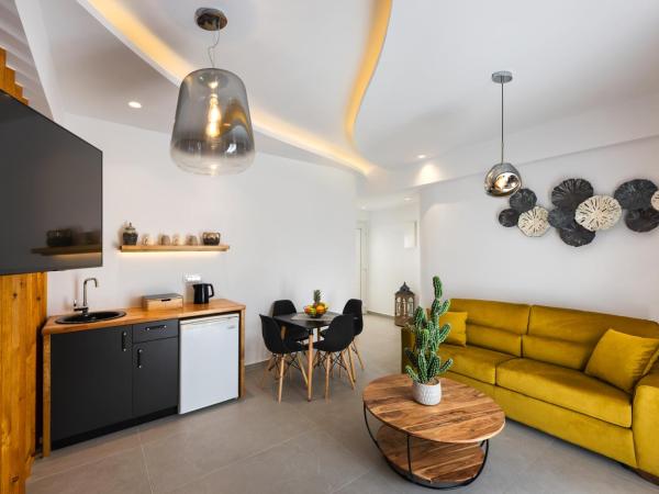 Alizea Villas & Suites : photo 2 de la chambre suite lit king-size avec baignoire spa