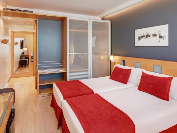 Sercotel Caspe : photo 4 de la chambre chambre lits jumeaux avec lit d’appoint - 301