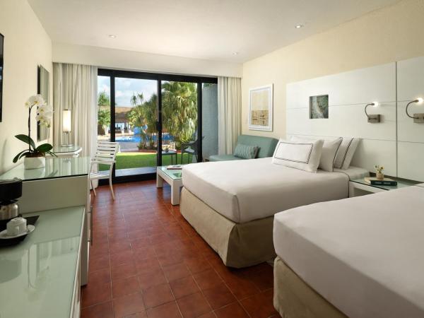 Melia Cozumel All Inclusive : photo 2 de la chambre hébergement melia - vue sur jardin