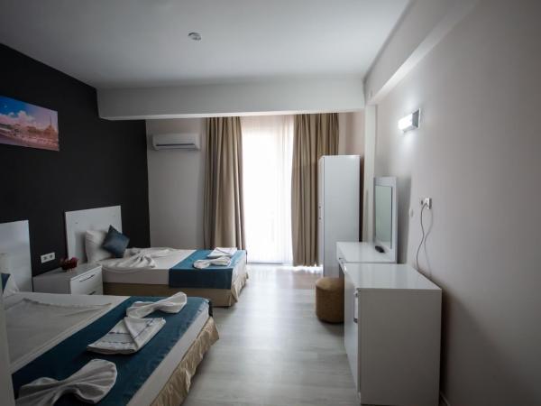 MOONBOW BEACH HOTEL : photo 6 de la chambre chambre familiale - vue sur mer