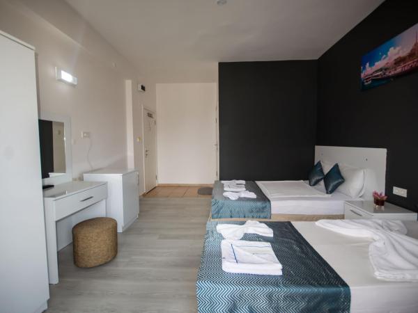 MOONBOW BEACH HOTEL : photo 7 de la chambre chambre familiale - vue sur mer