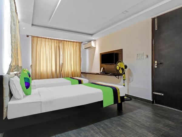 Treebo JJ Residency : photo 7 de la chambre chambre double standard