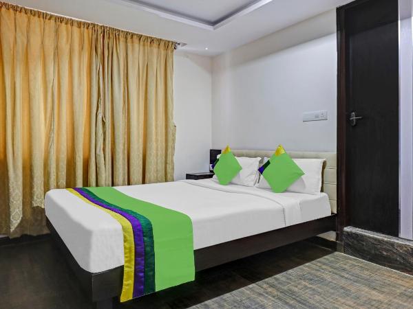 Treebo JJ Residency : photo 1 de la chambre chambre double standard