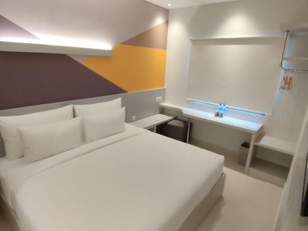 Agogo Downtown Hotel Surabaya : photo 1 de la chambre chambre lit king-size supérieure