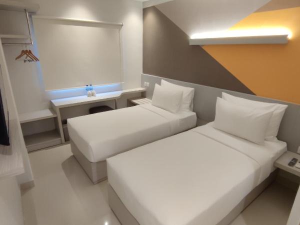 Agogo Downtown Hotel Surabaya : photo 3 de la chambre chambre lits jumeaux supérieure