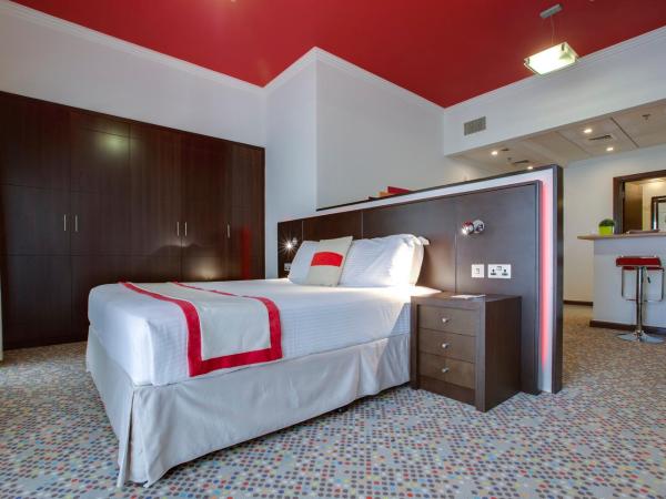 MENA ApartHotel Albarsha At The Mall : photo 2 de la chambre studio - non-fumeurs - lit king-size - 20 % de réduction sur nourriture et boissons et service de blanchisserie