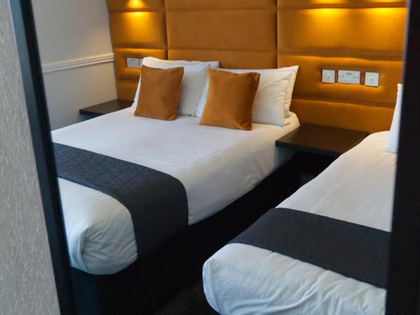 The Bromley : photo 2 de la chambre chambre triple supérieure - vue sur mer