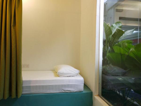 Beds In Garden Hostel : photo 2 de la chambre suite familiale