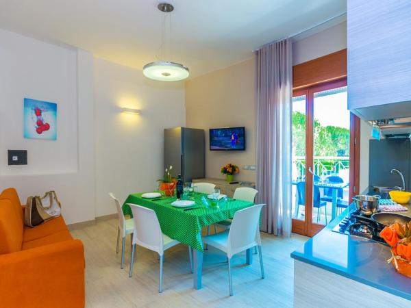 Villaggio Mare Blu : photo 1 de la chambre appartement - vue sur jardin