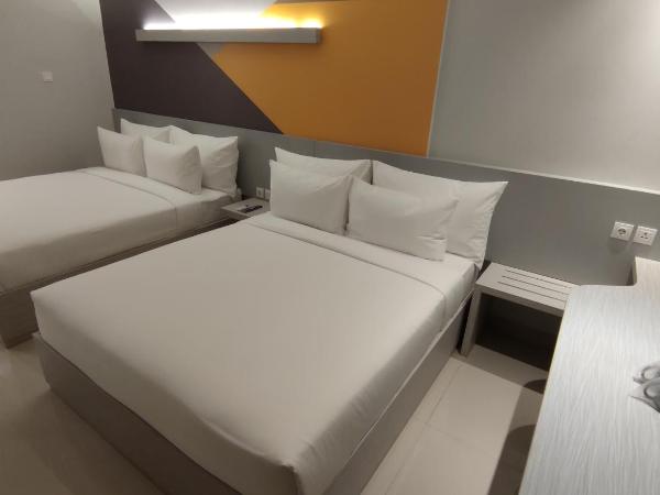 Agogo Downtown Hotel Surabaya : photo 3 de la chambre chambre quadruple