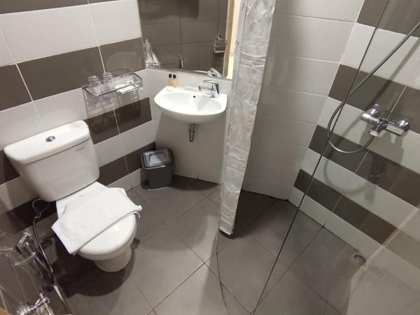 Agogo Downtown Hotel Surabaya : photo 5 de la chambre chambre quadruple