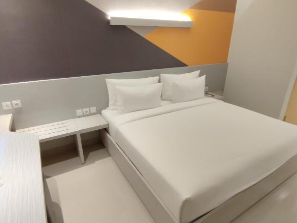 Agogo Downtown Hotel Surabaya : photo 2 de la chambre chambre lit king-size deluxe