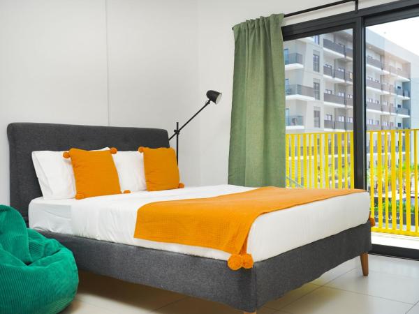 YouCo coliving Dubai : photo 2 de la chambre chambre lit queen-size avec salle de bains commune