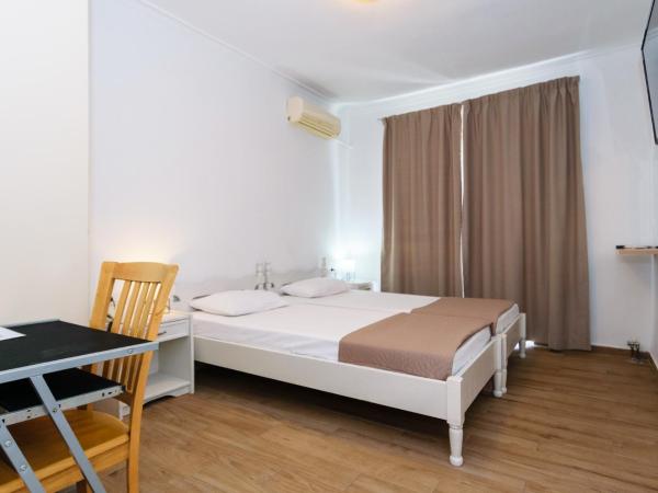 Archontiki City Hotel : photo 1 de la chambre chambre lits jumeaux