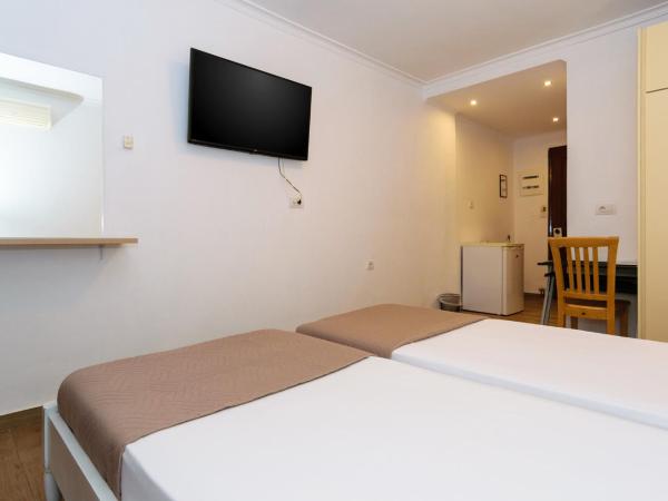 Archontiki City Hotel : photo 4 de la chambre chambre lits jumeaux