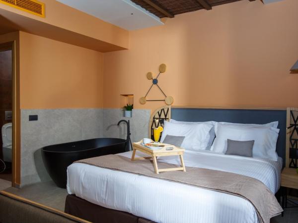 Palmera Beach Hotel & Spa - Adults Only : photo 5 de la chambre suite romantique deluxe avec jacuzzi