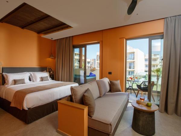 Palmera Beach Hotel & Spa - Adults Only : photo 7 de la chambre suite romantique deluxe avec jacuzzi