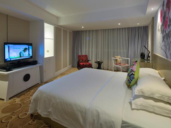 Paco Hotel Tuanyida Metro Guangzhou-Canton Fair free shuttle bus : photo 7 de la chambre chambre lit queen-size de luxe