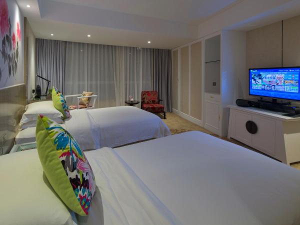 Paco Hotel Tuanyida Metro Guangzhou-Canton Fair free shuttle bus : photo 7 de la chambre chambre lits jumeaux deluxe