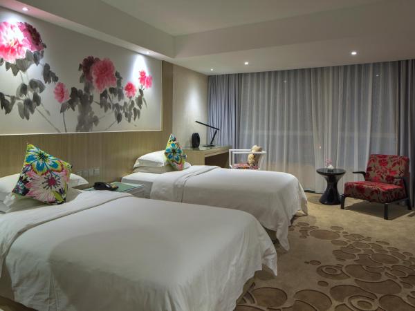 Paco Hotel Tuanyida Metro Guangzhou-Canton Fair free shuttle bus : photo 5 de la chambre chambre lits jumeaux deluxe