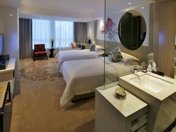 Paco Hotel Tuanyida Metro Guangzhou-Canton Fair free shuttle bus : photo 4 de la chambre chambre lits jumeaux deluxe