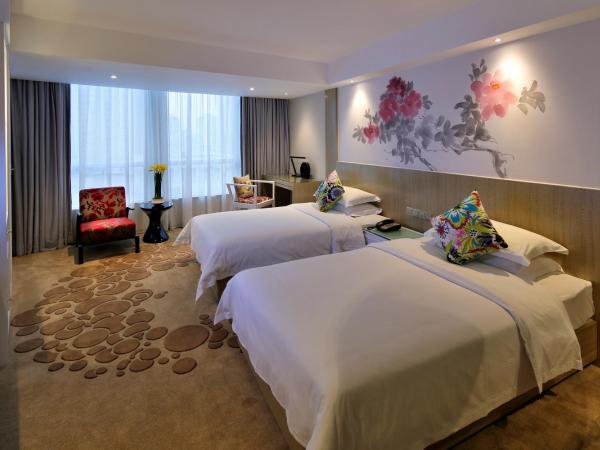 Paco Hotel Tuanyida Metro Guangzhou-Canton Fair free shuttle bus : photo 6 de la chambre chambre lits jumeaux deluxe