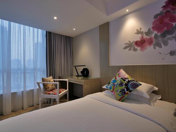 Paco Hotel Tuanyida Metro Guangzhou-Canton Fair free shuttle bus : photo 8 de la chambre chambre lits jumeaux deluxe