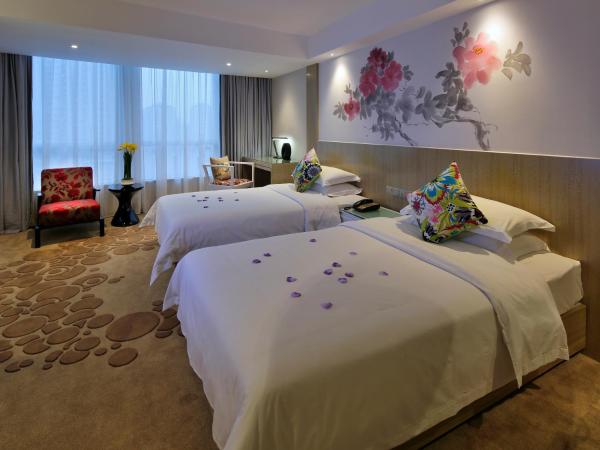 Paco Hotel Tuanyida Metro Guangzhou-Canton Fair free shuttle bus : photo 2 de la chambre chambre lits jumeaux deluxe