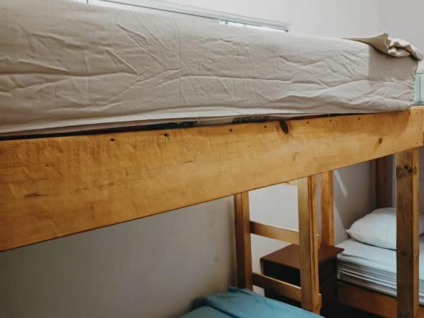 El Costeñito Hostal : photo 1 de la chambre chambre quadruple avec salle de bains commune
