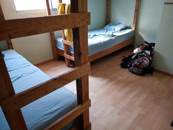 El Costeñito Hostal : photo 6 de la chambre chambre quadruple avec salle de bains commune